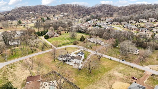 birds eye view of property with a residential view