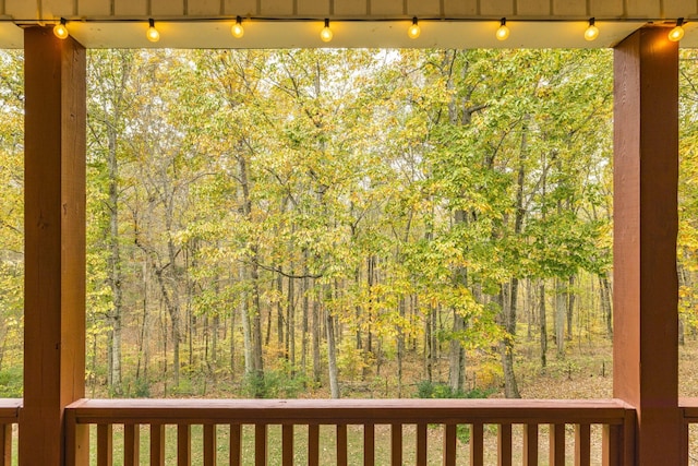 exterior space with a forest view