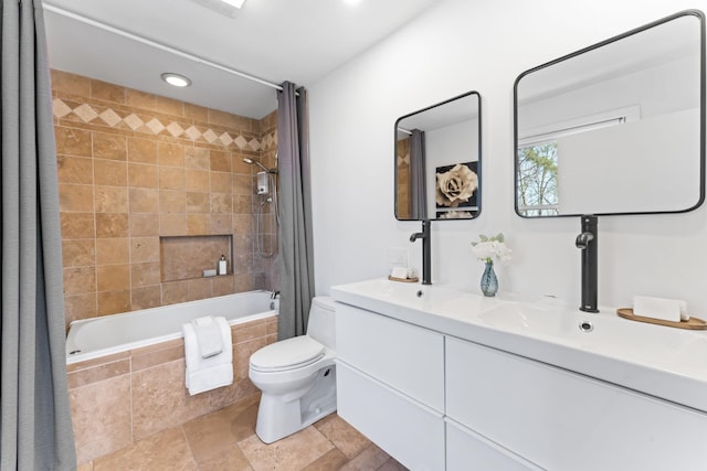 bathroom with tiled shower / bath, recessed lighting, toilet, stone finish flooring, and vanity