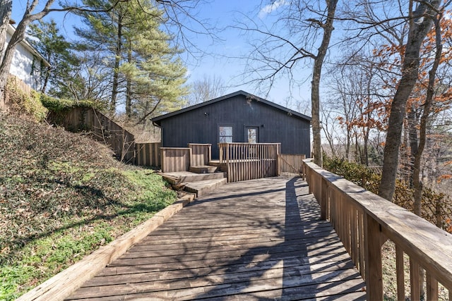 rear view of house with a deck