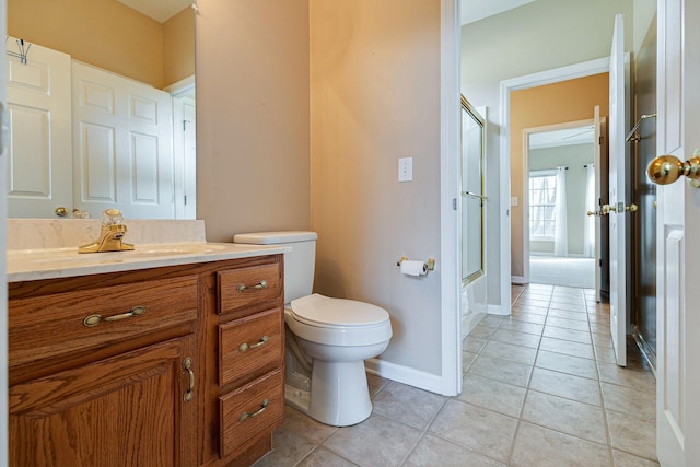 full bathroom with vanity, tile patterned flooring, an enclosed shower, and toilet