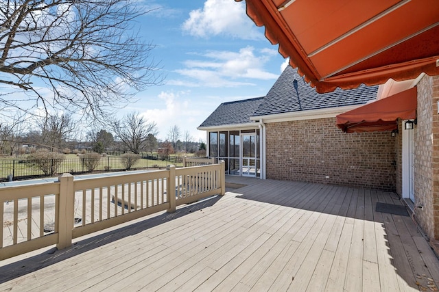 wooden deck featuring fence