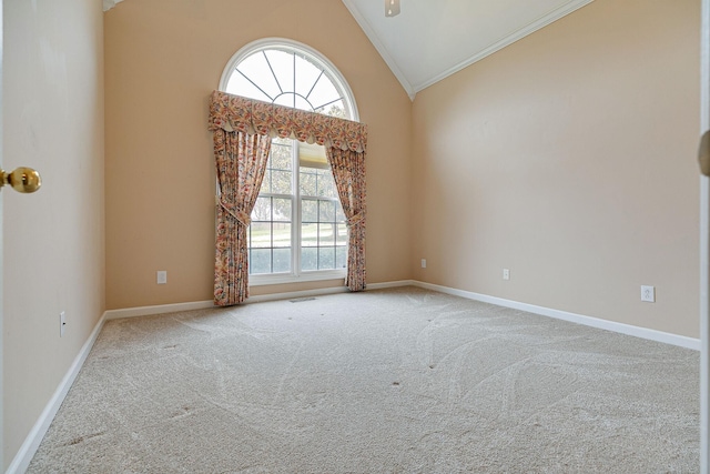 unfurnished room with carpet floors, baseboards, high vaulted ceiling, and ornamental molding