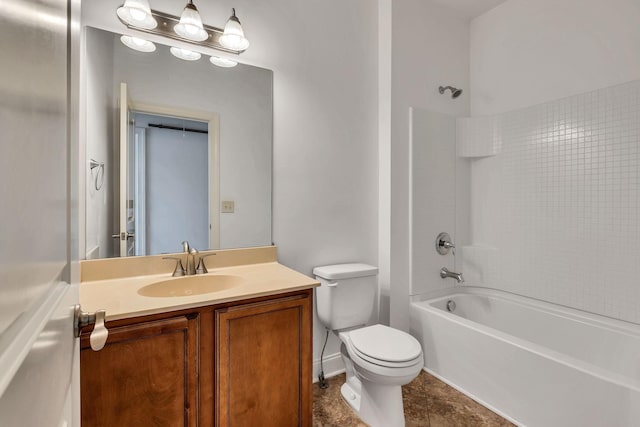 full bath with shower / bathtub combination, toilet, vanity, baseboards, and tile patterned floors