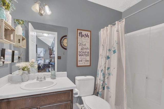 full bath featuring curtained shower, vaulted ceiling, vanity, and toilet