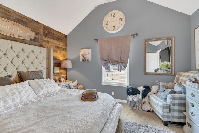 bedroom featuring lofted ceiling, carpet floors, and wood walls