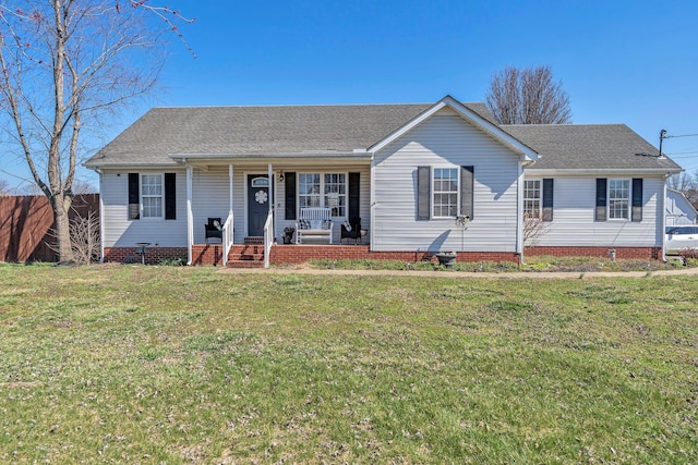 single story home with crawl space, covered porch, roof with shingles, and a front yard