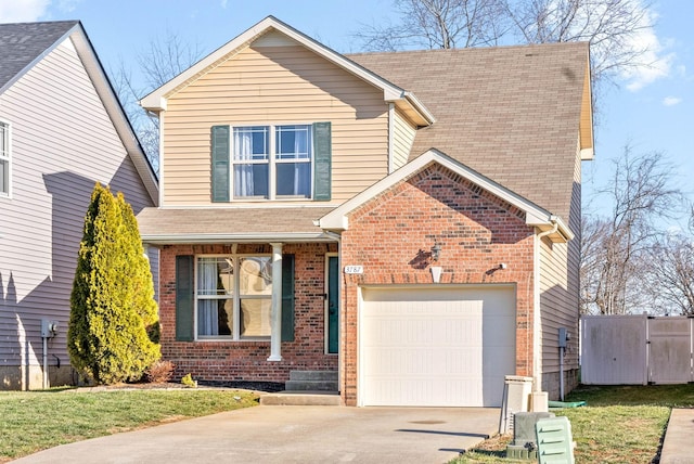 traditional home featuring a garage, driveway, brick siding, and roof with shingles