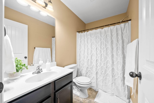 full bathroom with toilet, curtained shower, and vanity