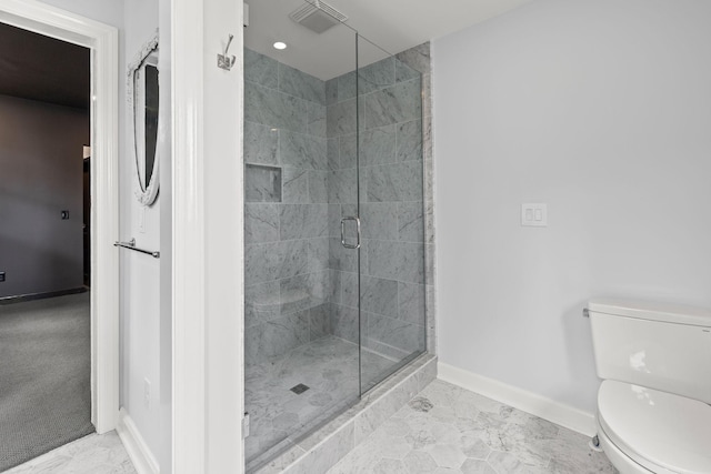 full bathroom with marble finish floor, visible vents, toilet, a shower stall, and baseboards