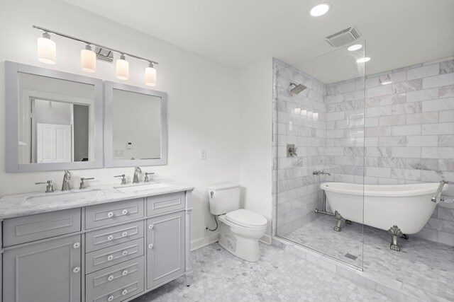 full bathroom featuring double vanity, visible vents, a sink, and tiled shower