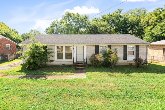 ranch-style house with entry steps, brick siding, roof with shingles, crawl space, and a front yard