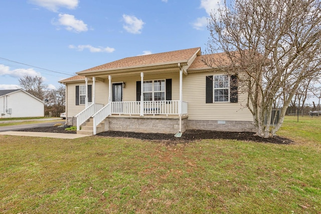 view of front of home featuring crawl space, covered porch, a front lawn, and roof with shingles