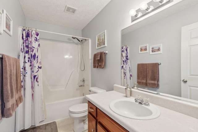 bathroom with visible vents, toilet, vanity, shower / bath combination with curtain, and a textured ceiling