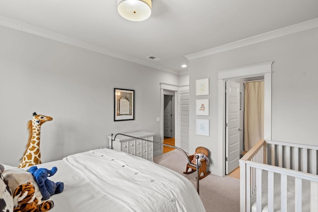 bedroom with light carpet, baseboards, visible vents, and crown molding