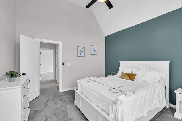 bedroom featuring light colored carpet, attic access, ceiling fan, high vaulted ceiling, and baseboards