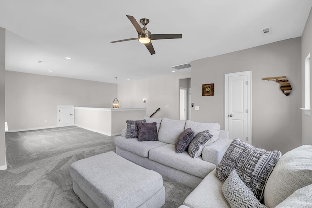 carpeted living room with recessed lighting, visible vents, ceiling fan, and baseboards