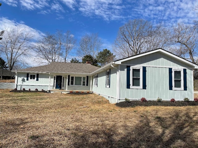 ranch-style home featuring a front yard, crawl space, roof with shingles, and a chimney