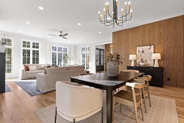 dining area with light wood-type flooring, ceiling fan, and recessed lighting