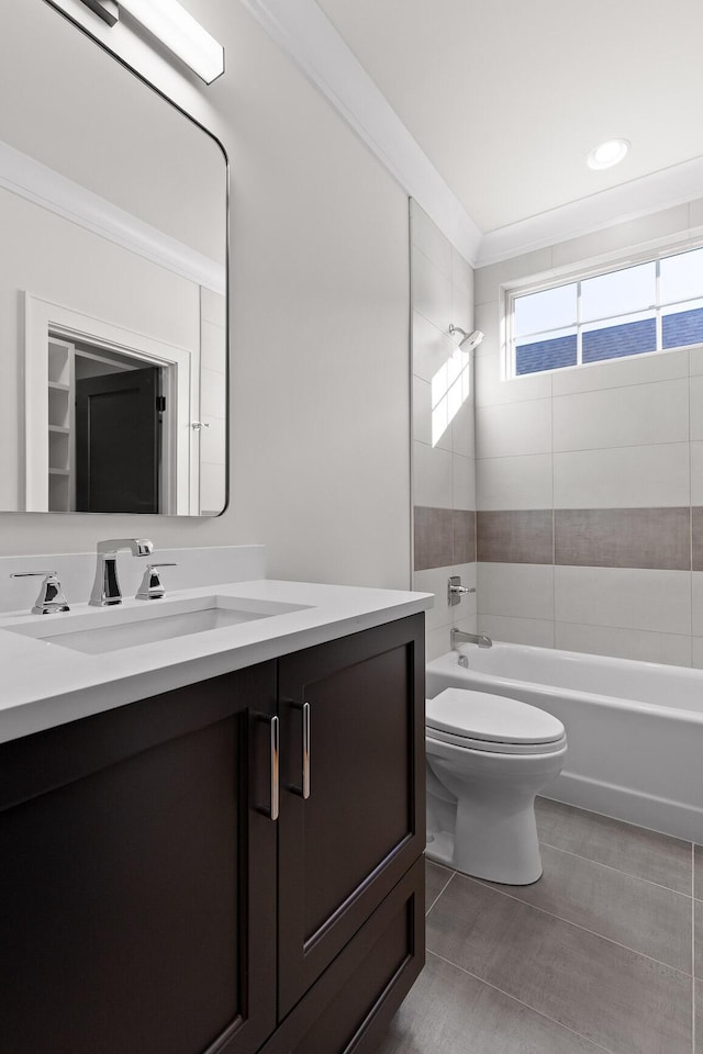 full bathroom with crown molding, toilet, vanity,  shower combination, and tile patterned floors