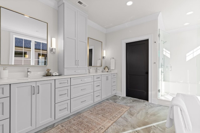 bathroom with double vanity, a stall shower, visible vents, marble finish floor, and a sink