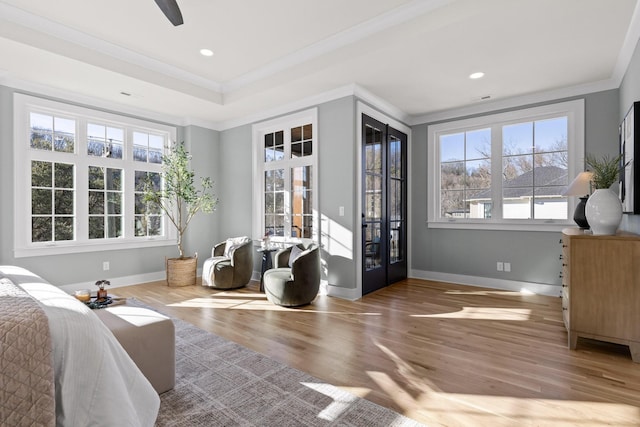 bedroom featuring recessed lighting, ornamental molding, wood finished floors, access to outside, and baseboards