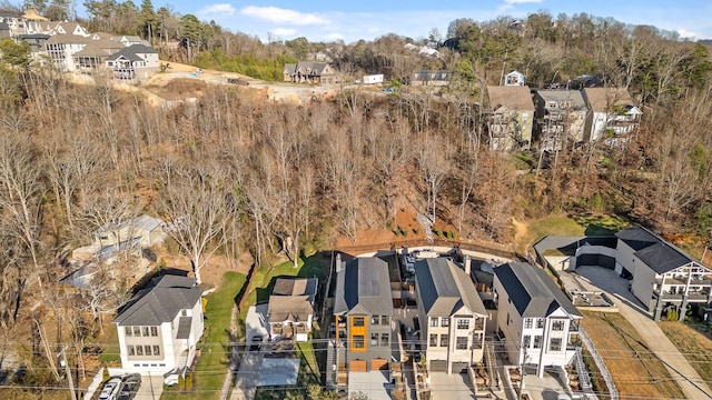 birds eye view of property with a residential view