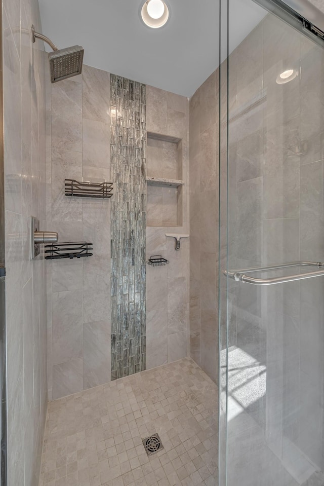 bathroom featuring a stall shower