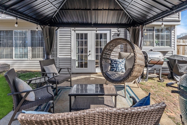 view of patio featuring a gazebo and french doors