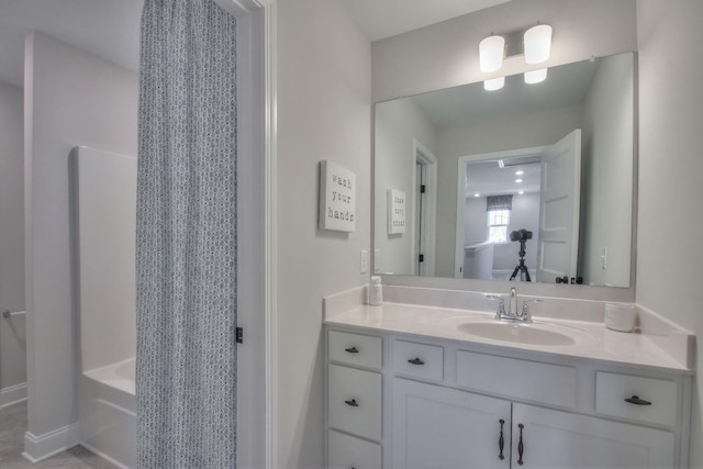 full bathroom with shower / bathtub combination with curtain and vanity