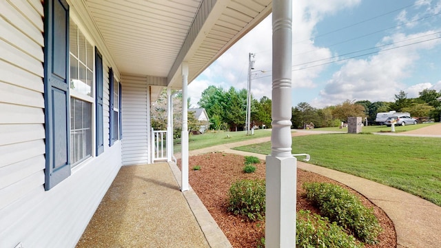 view of yard with a porch