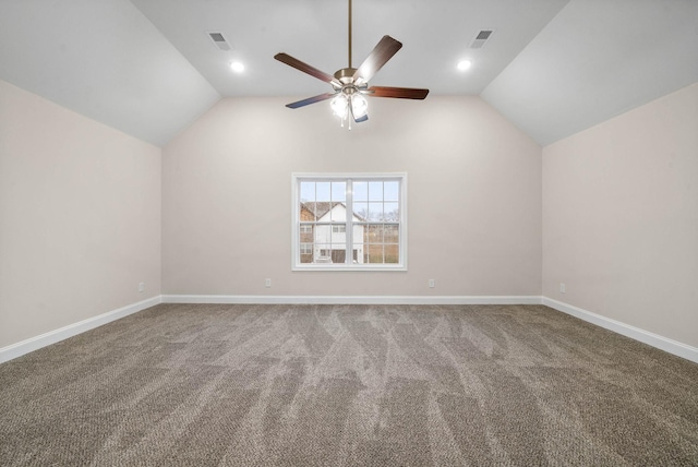 additional living space featuring visible vents, carpet flooring, baseboards, and vaulted ceiling