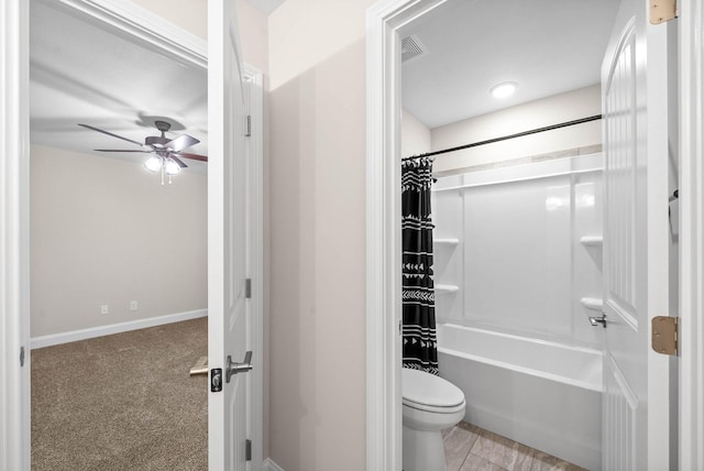 full bath with visible vents, baseboards, toilet, shower / bath combination with curtain, and a ceiling fan