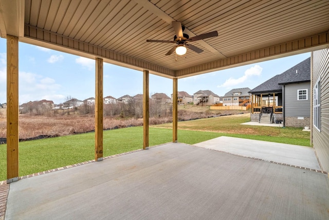 view of patio / terrace with a residential view and ceiling fan