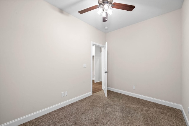 unfurnished room with baseboards, carpet, and ceiling fan