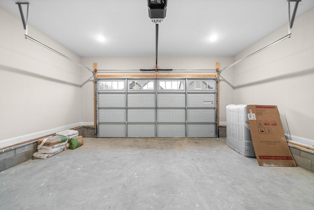 garage featuring a garage door opener