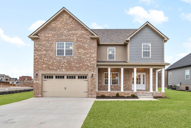 view of front of property with a front lawn, covered porch, concrete driveway, a garage, and brick siding