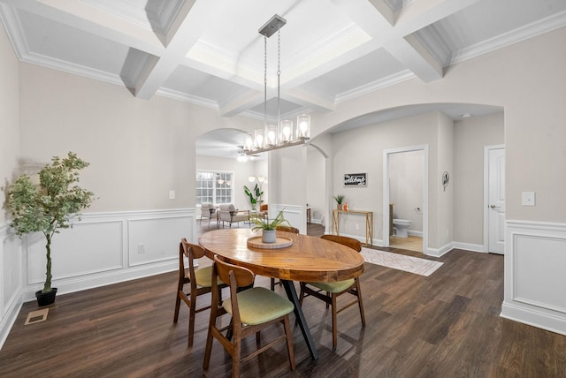 dining space featuring wood finished floors, visible vents, arched walkways, beamed ceiling, and a chandelier