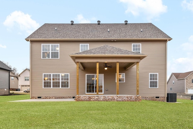 back of house with crawl space, central air condition unit, a lawn, and a ceiling fan