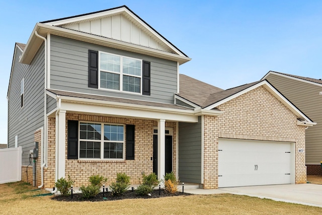 traditional-style house featuring driveway, brick siding, board and batten siding, and an attached garage