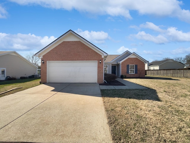 ranch-style home featuring driveway, fence, a front lawn, and brick siding