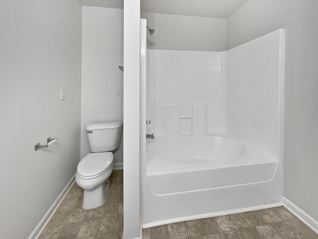 full bath featuring bathtub / shower combination, baseboards, and toilet