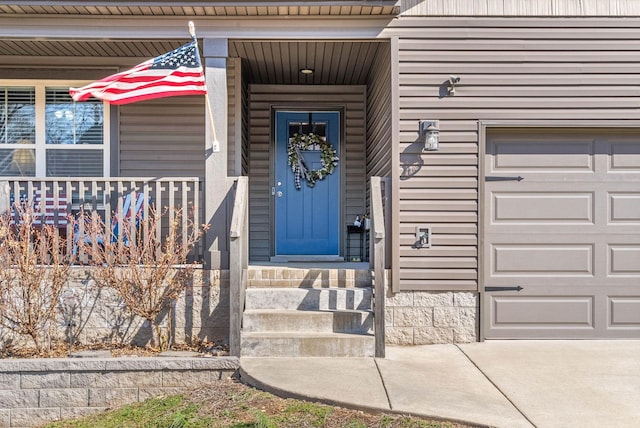 doorway to property with covered porch