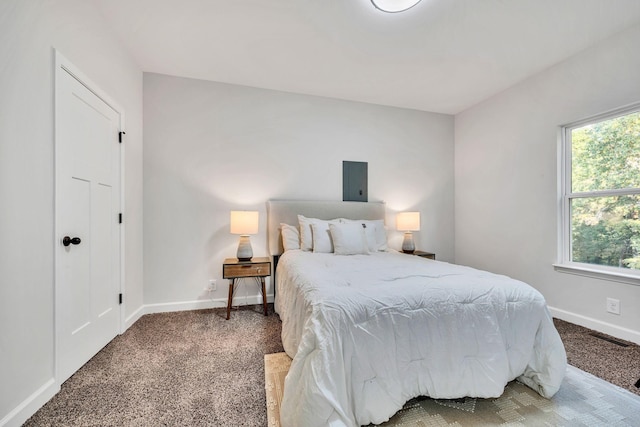 bedroom with carpet, visible vents, and baseboards