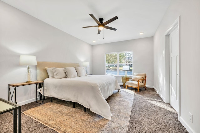 carpeted bedroom with recessed lighting, ceiling fan, and baseboards