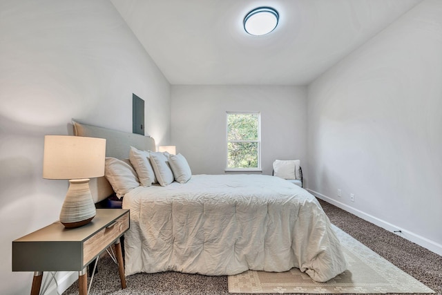 carpeted bedroom featuring baseboards