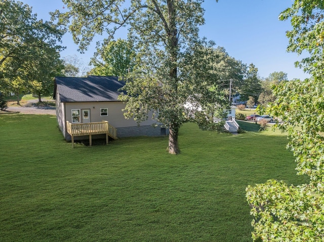 view of yard featuring a deck