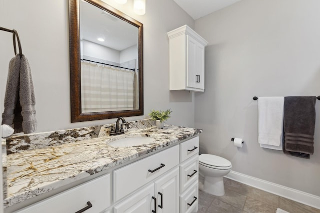 full bath with curtained shower, tile patterned flooring, toilet, vanity, and baseboards