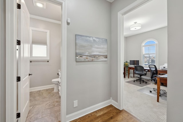 office area with baseboards and ornamental molding