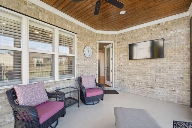 view of patio featuring a ceiling fan